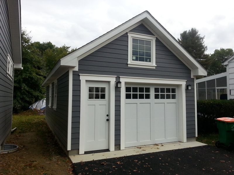 1 car garage with small office in rear. James hardiboard siding and pvc azek trim